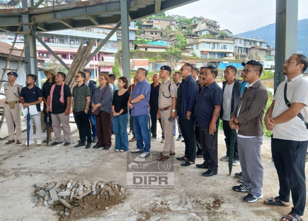 Minister for Housing & Mechanical Engineering, P. Bashangmongba Chang, along with district administration, DDMA and line department officials, inspect landslide-affected sites in Tuensang on August 12. (DIPR Photo)